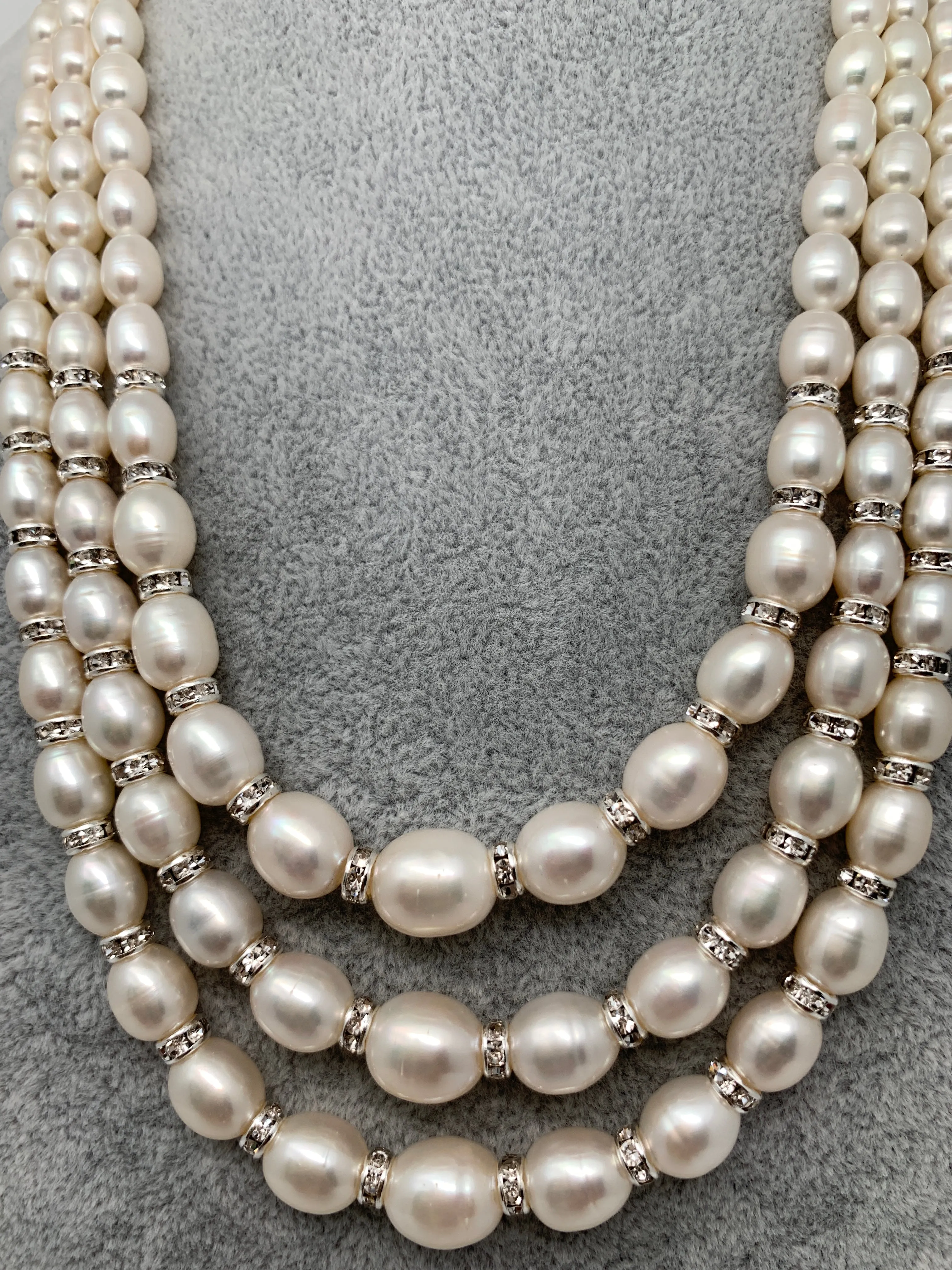 Three line Real Oval Kalgi Pearls Mala with Chakri and Gradiant Sized Pearls