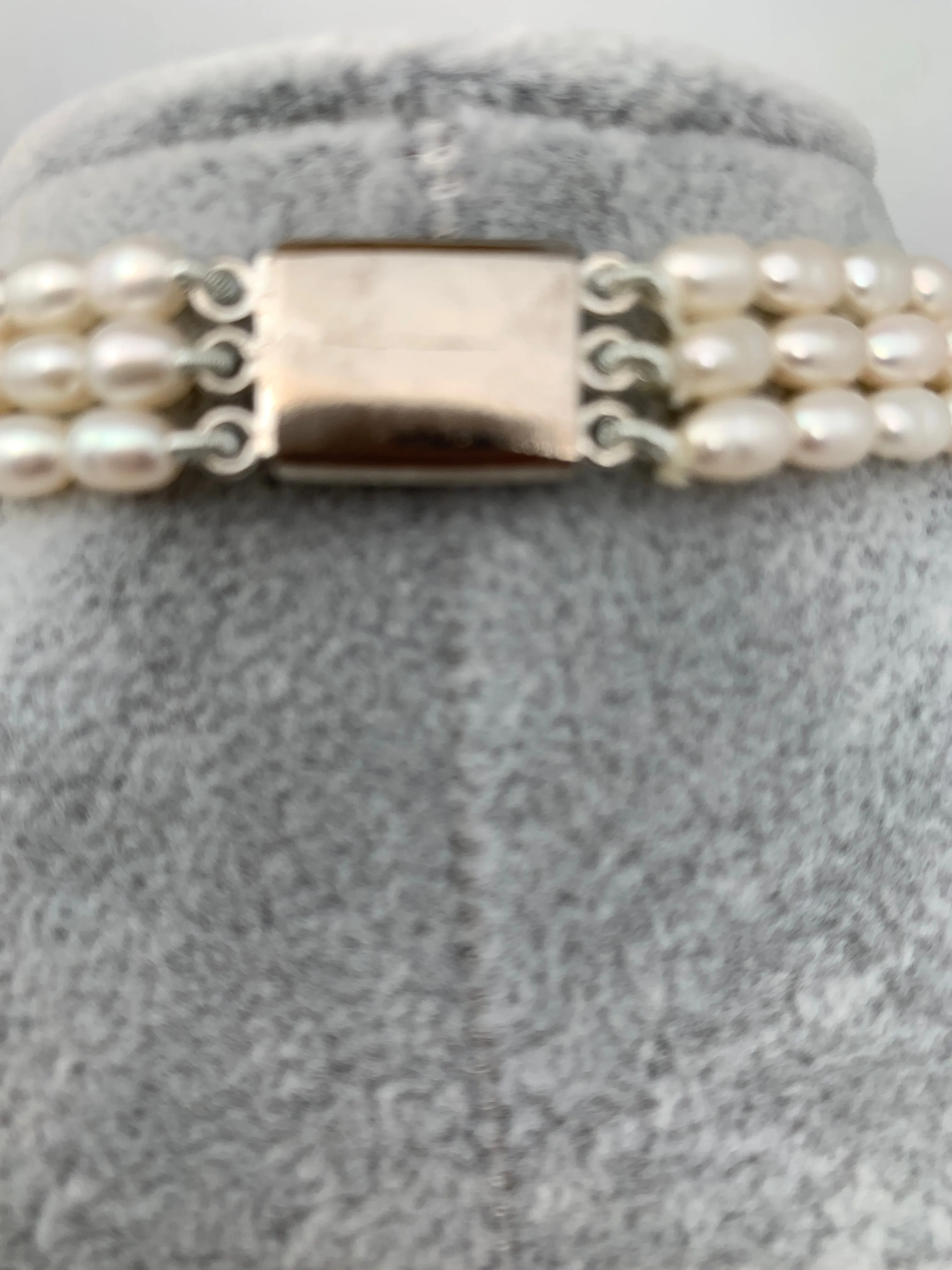 Three line Real Oval Kalgi Pearls Mala with Chakri and Gradiant Sized Pearls